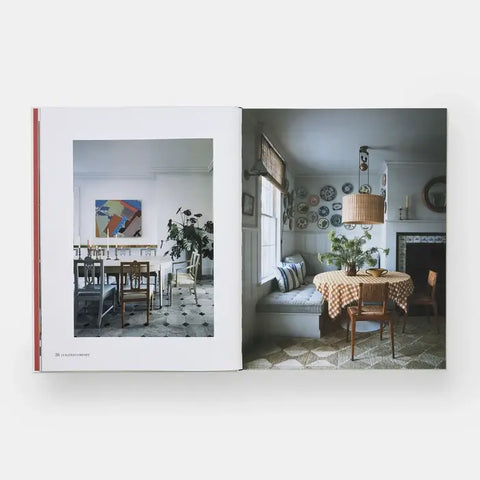 Open book showing interior design images of a living room and dining area.