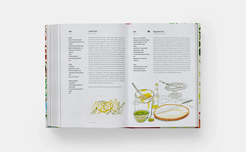 Open book with recipe pages and illustrations on a white background
