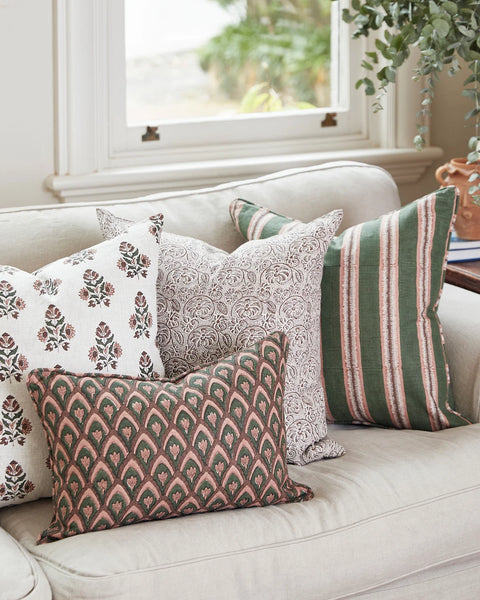 Fossano Cocoa pillow layered with coordinating pillows