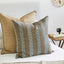 Khan Desert pillow layered with coordinating pillows