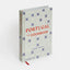 Book titled 'Portugal: The Cookbook' with a tiled design on the cover.