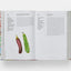 Open book showing a recipe with images of vegetables on a white background