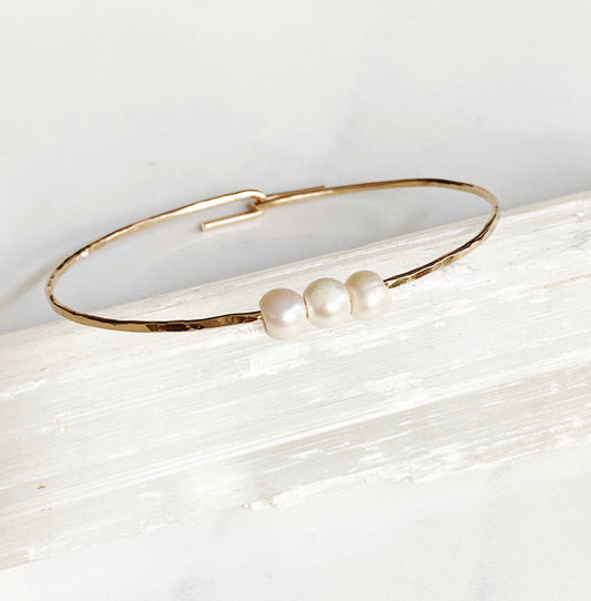 Modern sliding pearl cuff