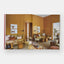Decorative book with a living room scene on the cover