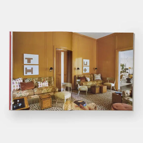 Decorative book with a living room scene on the cover