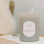 Cashmere candle in gray glass vessel