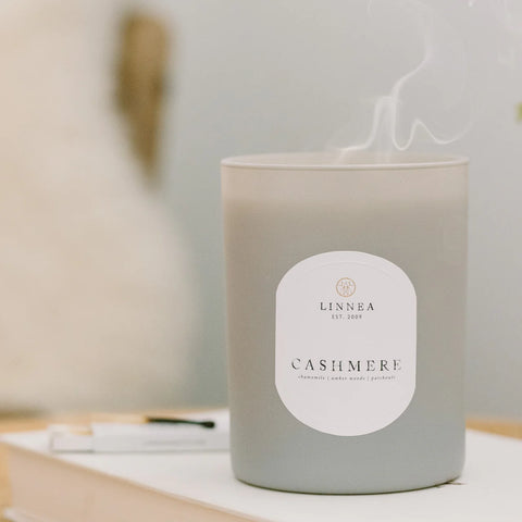 Cashmere candle in gray glass vessel