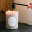 Lit Lavender Rosemary candle in gray glass vessel