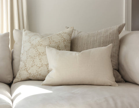 Landyn Stripe pillow layered with coordinating pillows