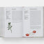 Open cookbook showing recipe pages with illustrations on a white background