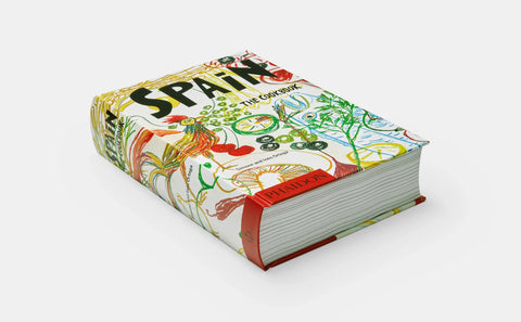 Colorful book titled 'Spain' on a white background